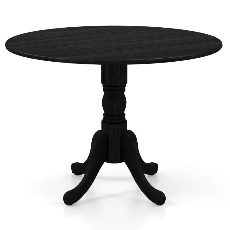 Table de salle à manger en bois avec plateau rond et pieds en tréteaux incurvés