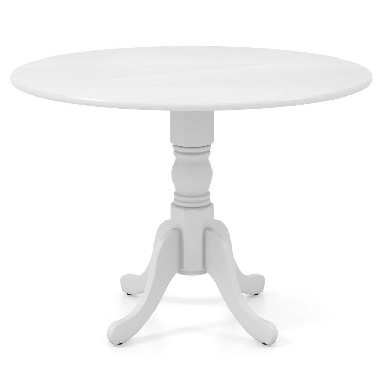 Table de salle à manger en bois avec plateau rond et pieds en tréteaux incurvés