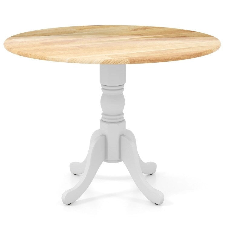 Table de salle à manger en bois avec plateau rond et pieds en tréteaux incurvés