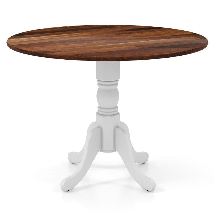 Table de salle à manger en bois avec plateau rond et pieds en tréteaux incurvés