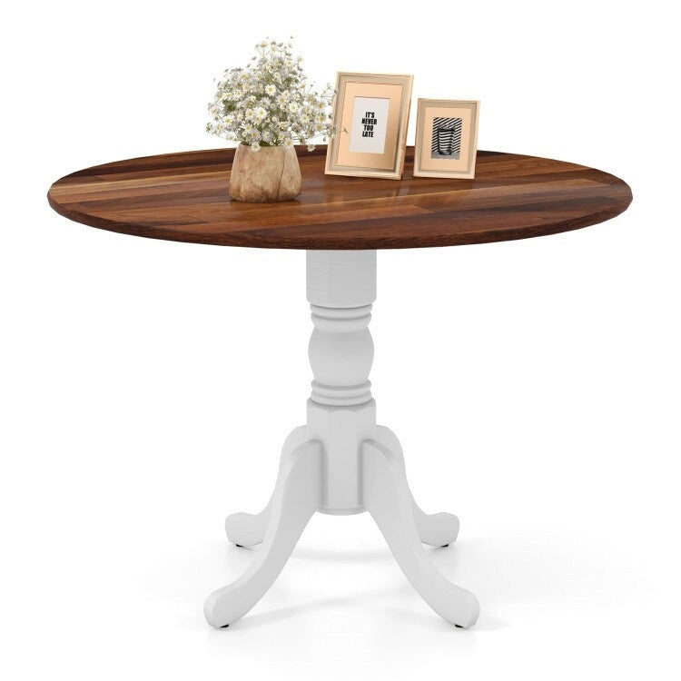 Table de salle à manger en bois avec plateau rond et pieds en tréteaux incurvés
