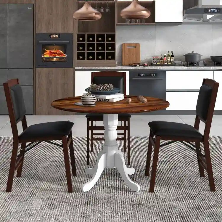 Table de salle à manger en bois avec plateau rond et pieds en tréteaux incurvés