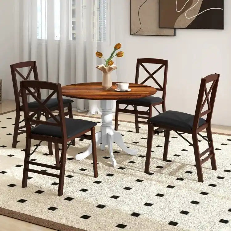 Table de salle à manger en bois avec plateau rond et pieds en tréteaux incurvés