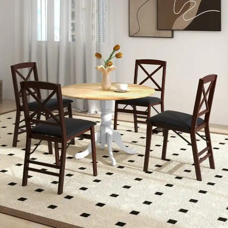 Table de salle à manger en bois avec plateau rond et pieds en tréteaux incurvés