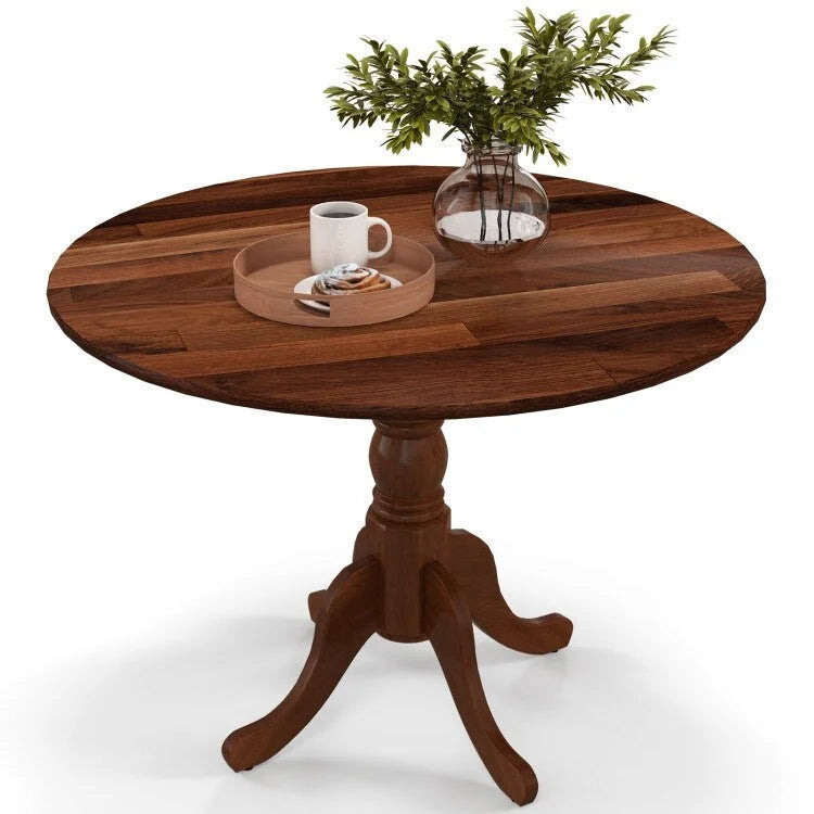 Table de salle à manger en bois avec plateau rond et pieds en tréteaux incurvés